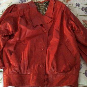 Vera Pelle Stylish red women's leather jacket with large buttons.